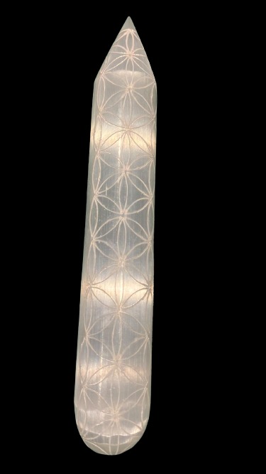 Clear Selenite crystal Etched with Flower of Life symbol Round massage wand shape Used for chakra balancing and spiritual healing Can be used as a meditation tool Beautiful addition to your crystal collection